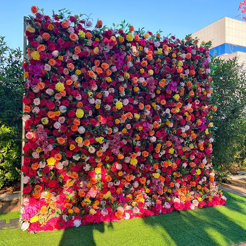 Floral wall with colorful flowers in a garden setting