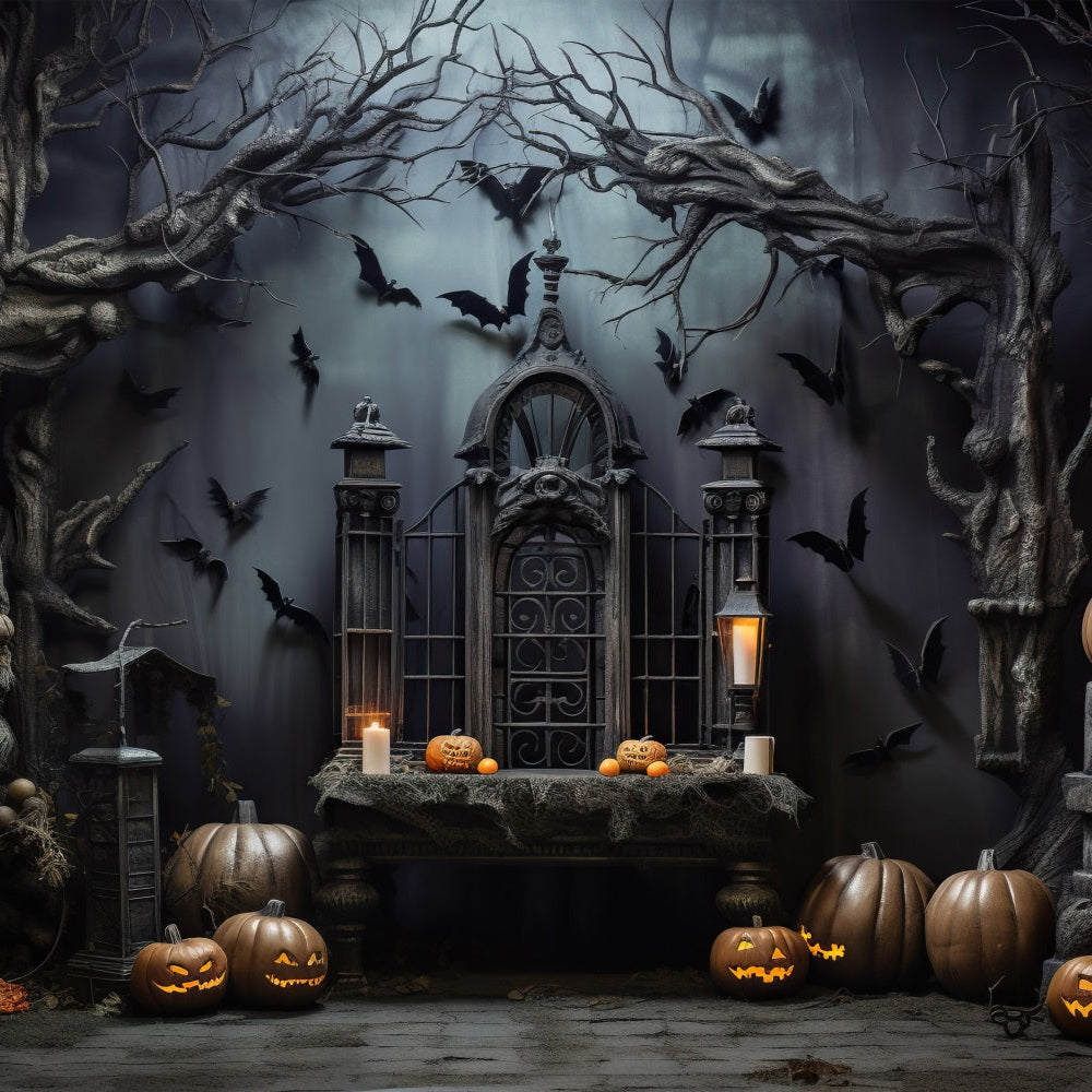 A spooky Halloween scene with a dark gothic gate, bare trees, flying bats, candles, and multiple carved jack-o'-lantern pumpkins on the ground and on a table.